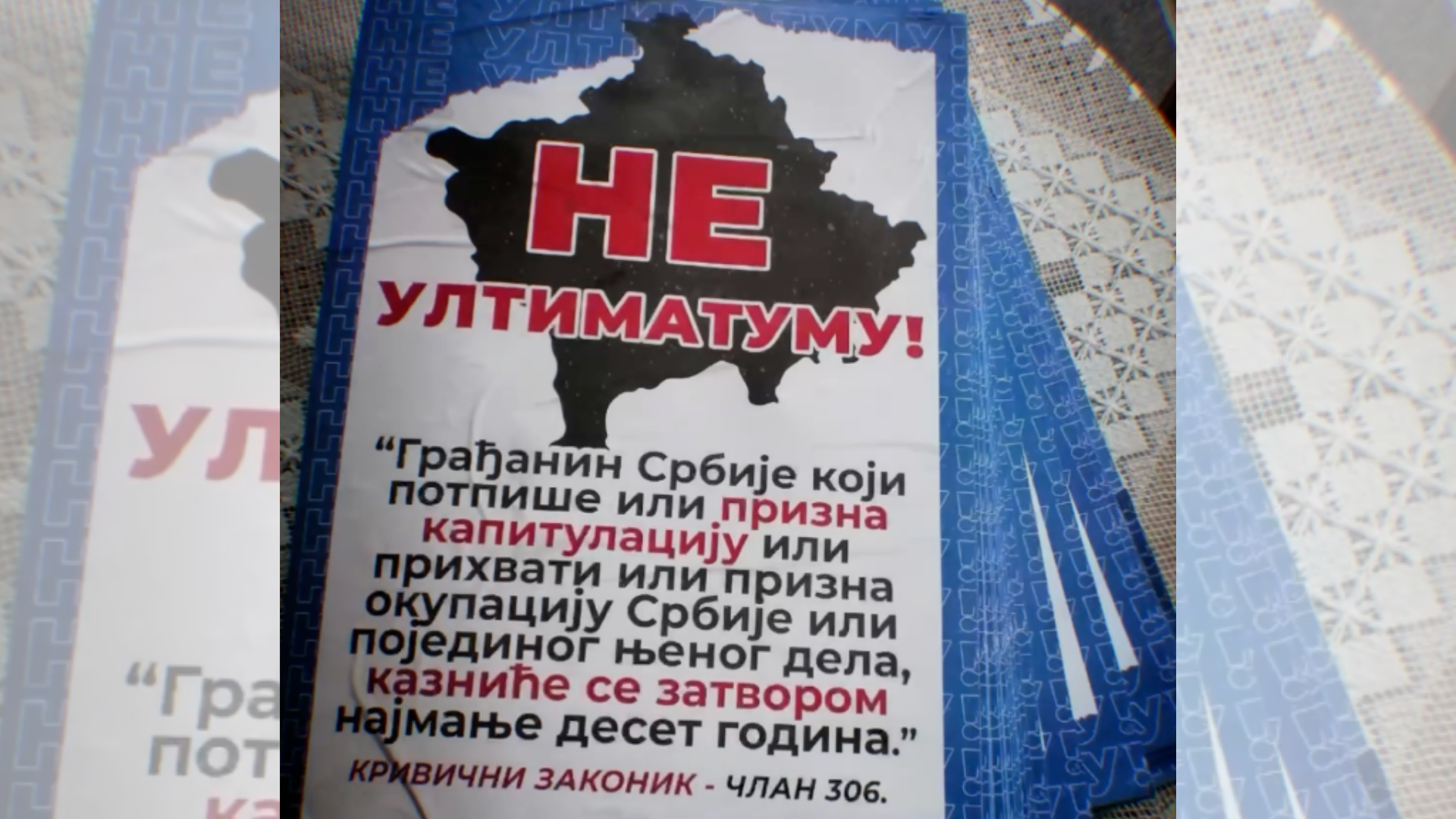 Плакати са сликом КиМ и чланом 306 Кривичног законика у центру Београда